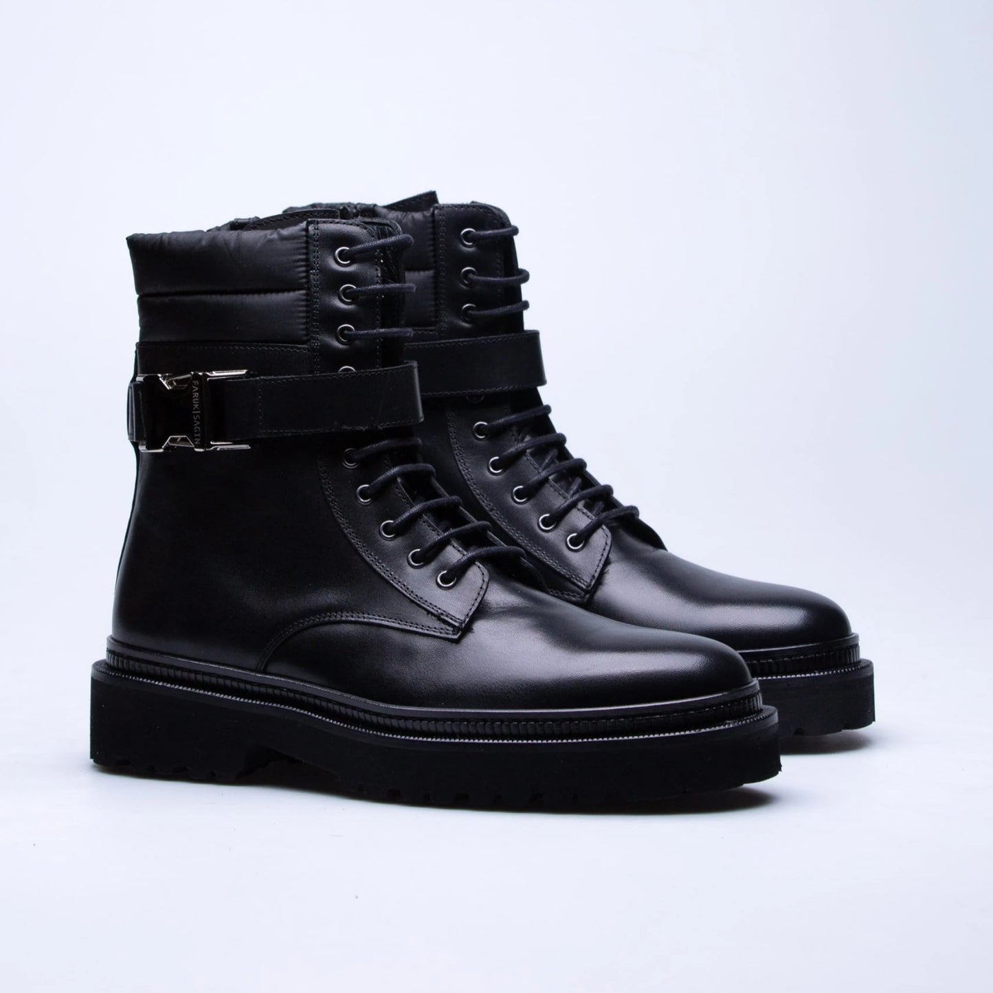 Thick-soled buckled leather light boots